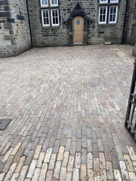 Block paving old school playground after cleaning by The Driveway Doctor